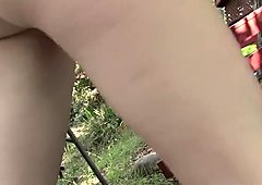 Slim brunette babe gets her mouth full of cum outdoors