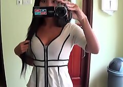 Sexy Brunette Asian Babe Fools Around With The Camera