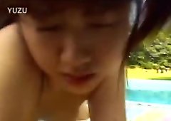 Pig tailed 18yo teen gets her pussy nailed with a lollipop by the pool