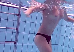 Lucy takes off bikini in the pool