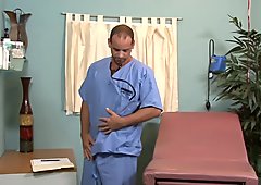 Horny gay doctor Girth Brooks masturbating in office
