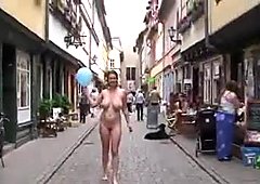 Pretty woman with giant huge saggy boobs naked on the street
