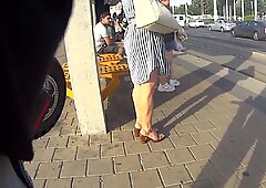 Massive Muscular Calves on Woman in Street
