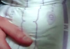 Vibrator in wet diaper causes loud moaning orgasm