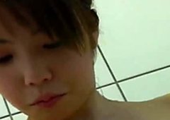 Amateur brunette Japanese teen Nozomi Momoi pleasing herself after shower
