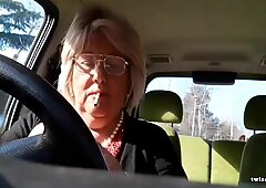 Italian granny masturbates in her car